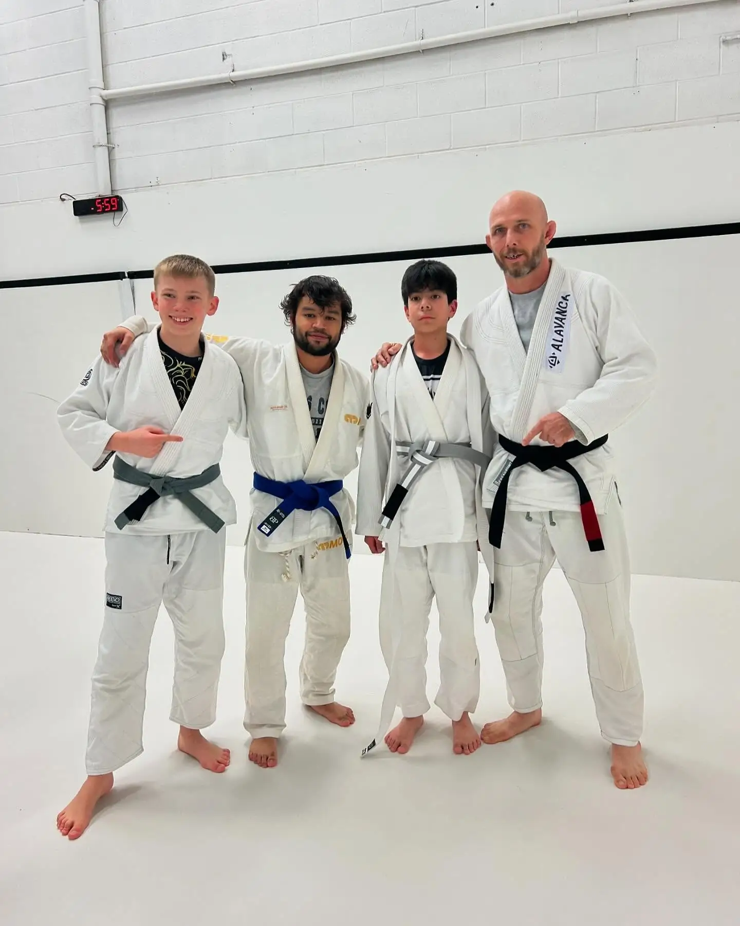 Youth Brazilian Jiu-Jitsu belt promotion group at ALAVANCA Shawnessy